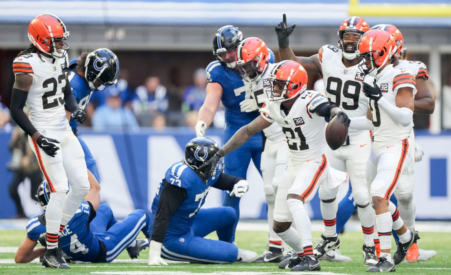 Oct 22, 2023; Indianapolis, Indiana, USA; Cleveland Browns cornerback Denzel Ward (21) celebrates after an interception during a game against the Indianapolis Colts at Lucas Oil Stadium.